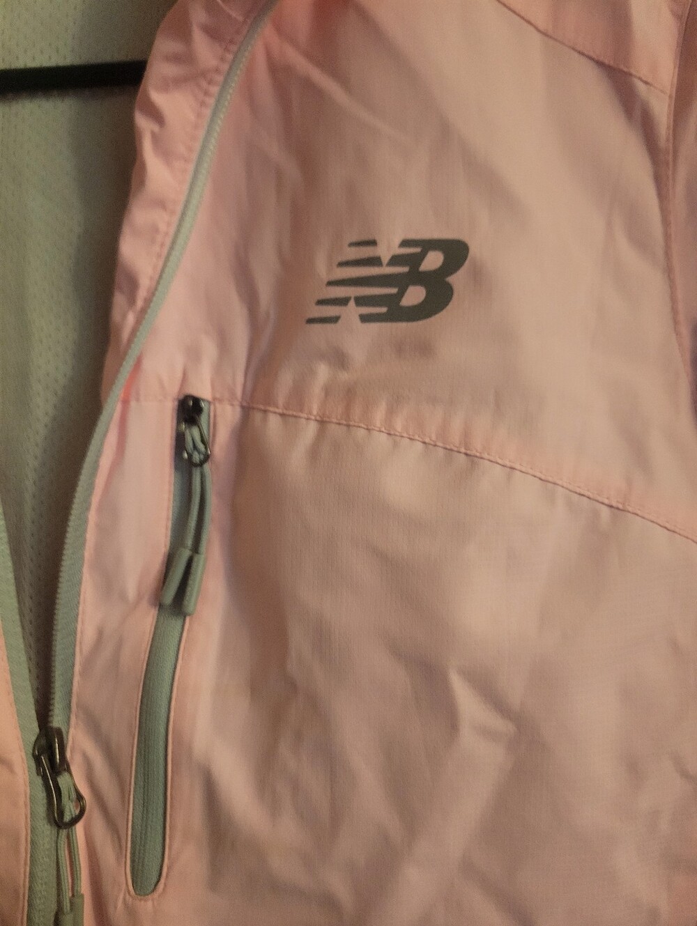 New Balance Light Pink Womends' Rain Jacket with Reflective Logo